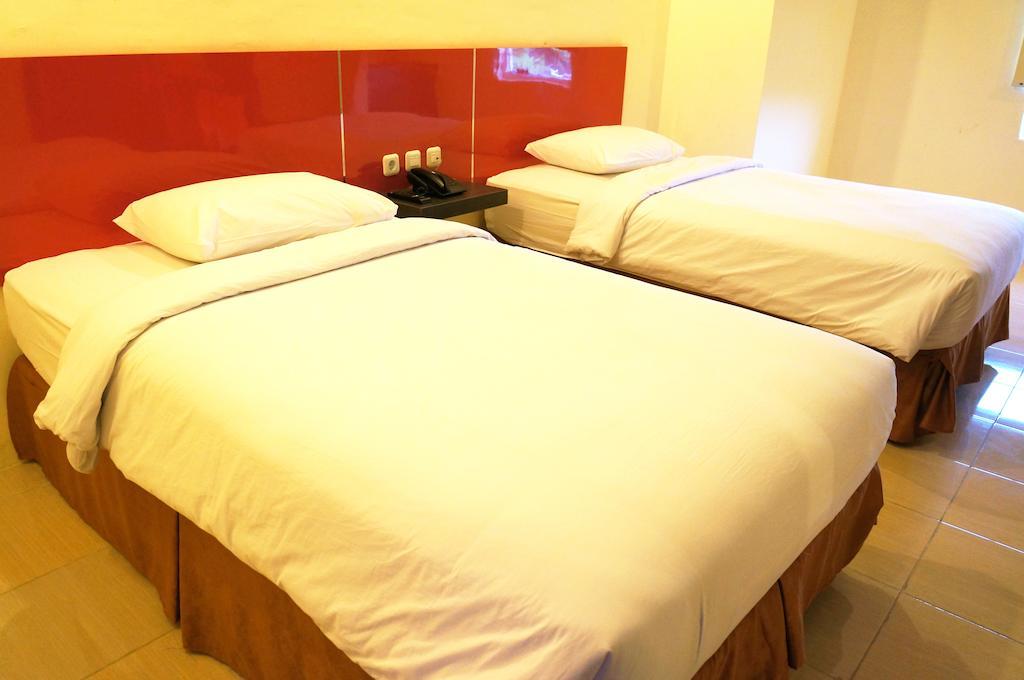 Quin Centro Hotel Palembang Room photo