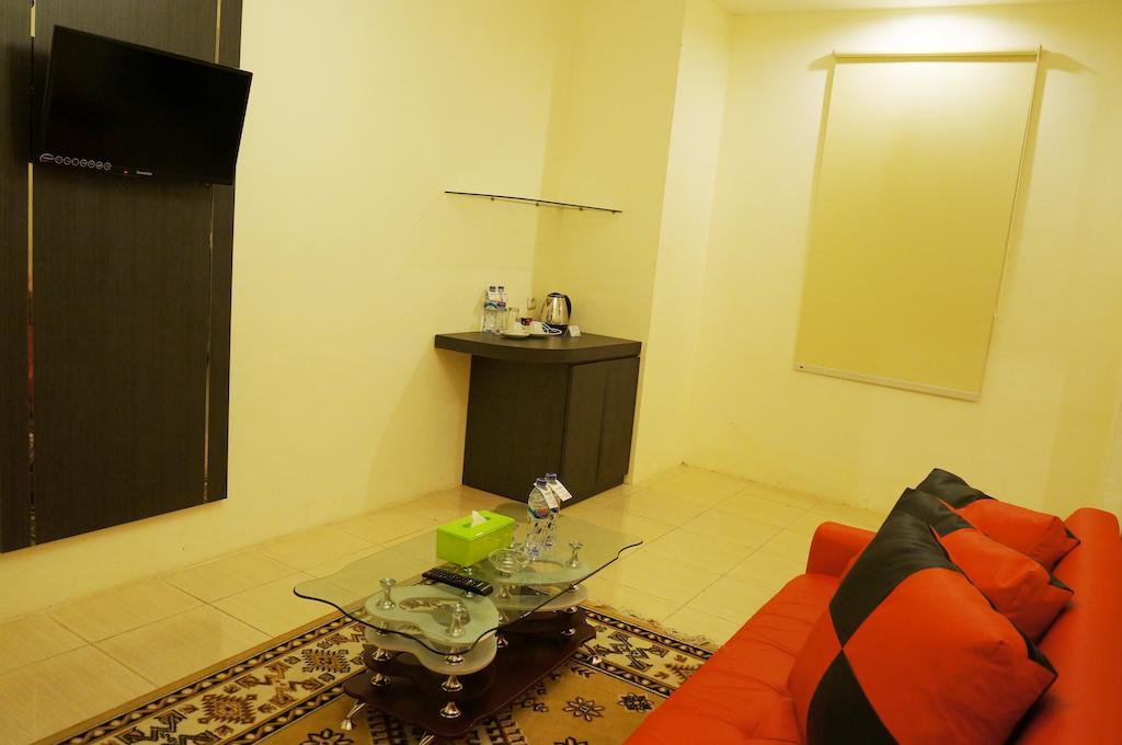 Quin Centro Hotel Palembang Room photo